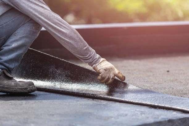 Professional Waterproofing technician working in Cadillac, MI